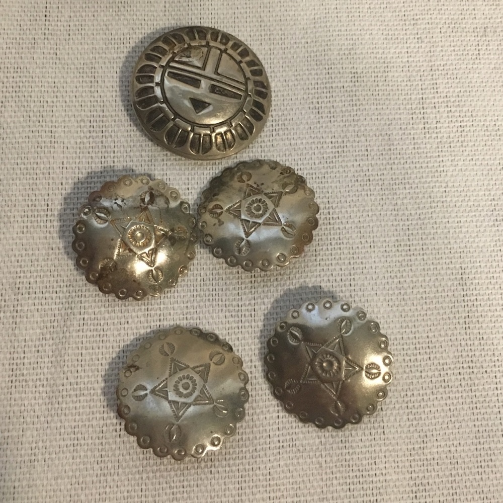 Silver toned Southwest styled buttons.